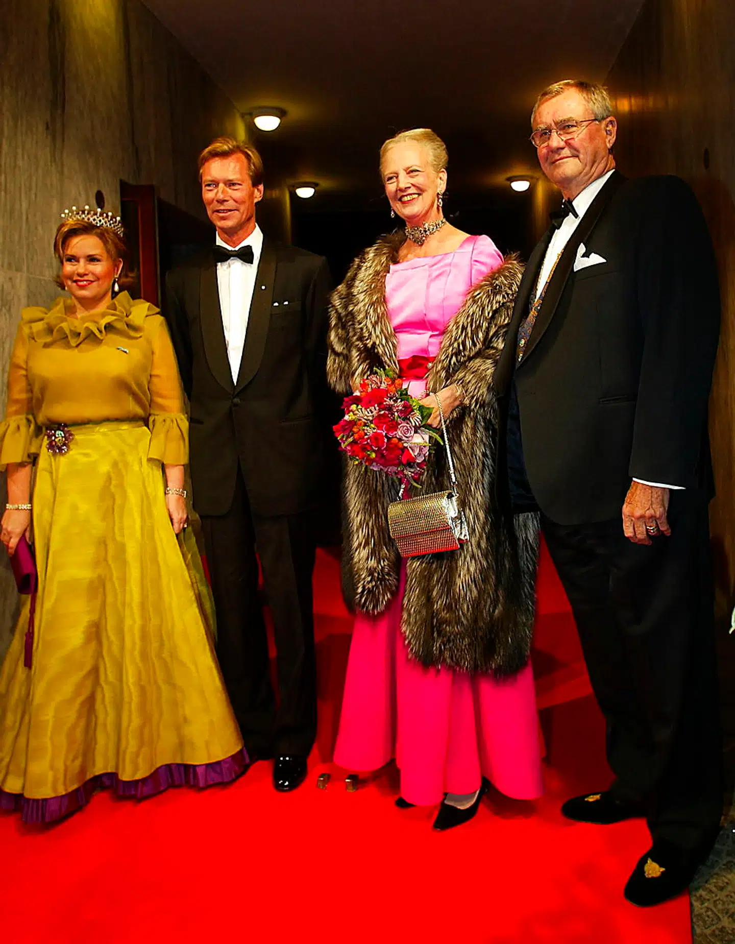 Luxembourgs storhertug Henri og storhertuginde Maria Teresa fotograferet i forbindelse med et officielt besøg i Danmark i 2003. Her på vej til koncert i sammen med dronning Margrethe og nu afdøde prins Henrik.
