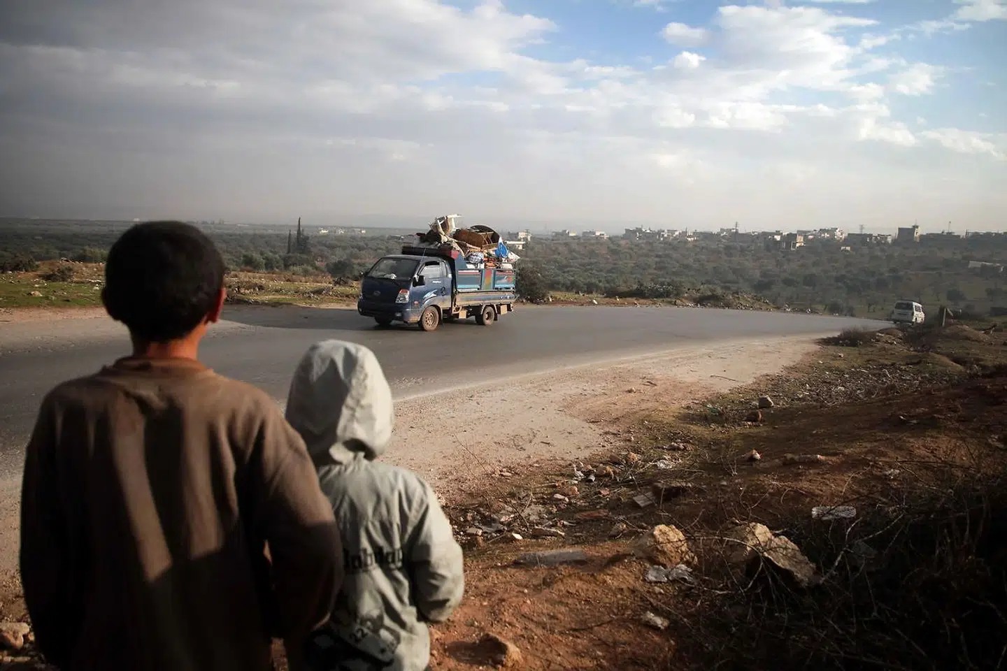 Syriske familer flygter fra Byen al-Mastumah i Idlib-provinsen d. 24 december 2019.