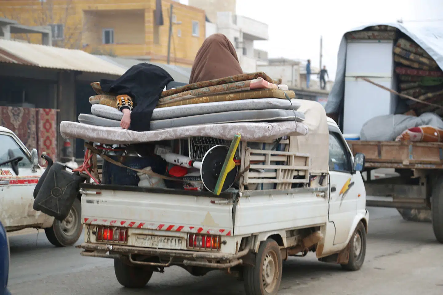 Syriske familer flygter fra Byen al-Mastumah i Idlib-provinsen d. 24 december 2019.