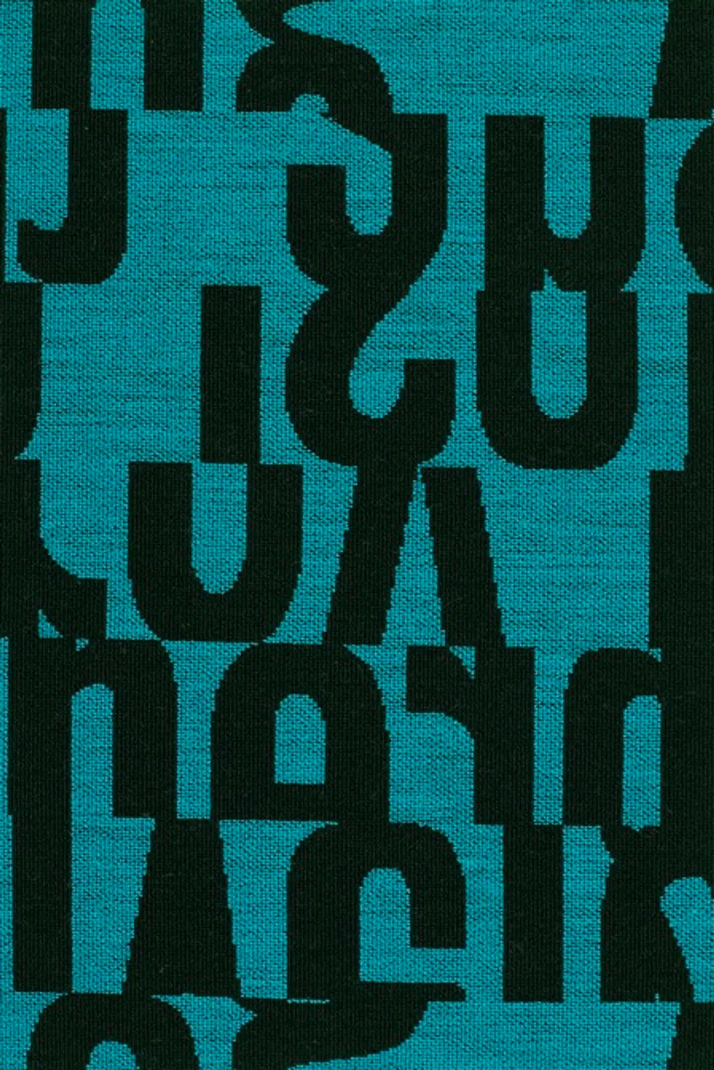 Møbeltekstilet »Letters« blev lavet med opskårne strimler af typografi, men ligner noget, der kunne være lavet på en computer.