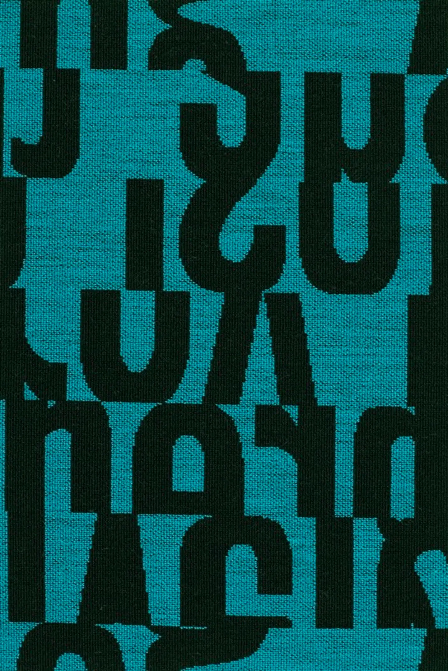 Møbeltekstilet »Letters« blev lavet med opskårne strimler af typografi, men ligner noget, der kunne være lavet på en computer.