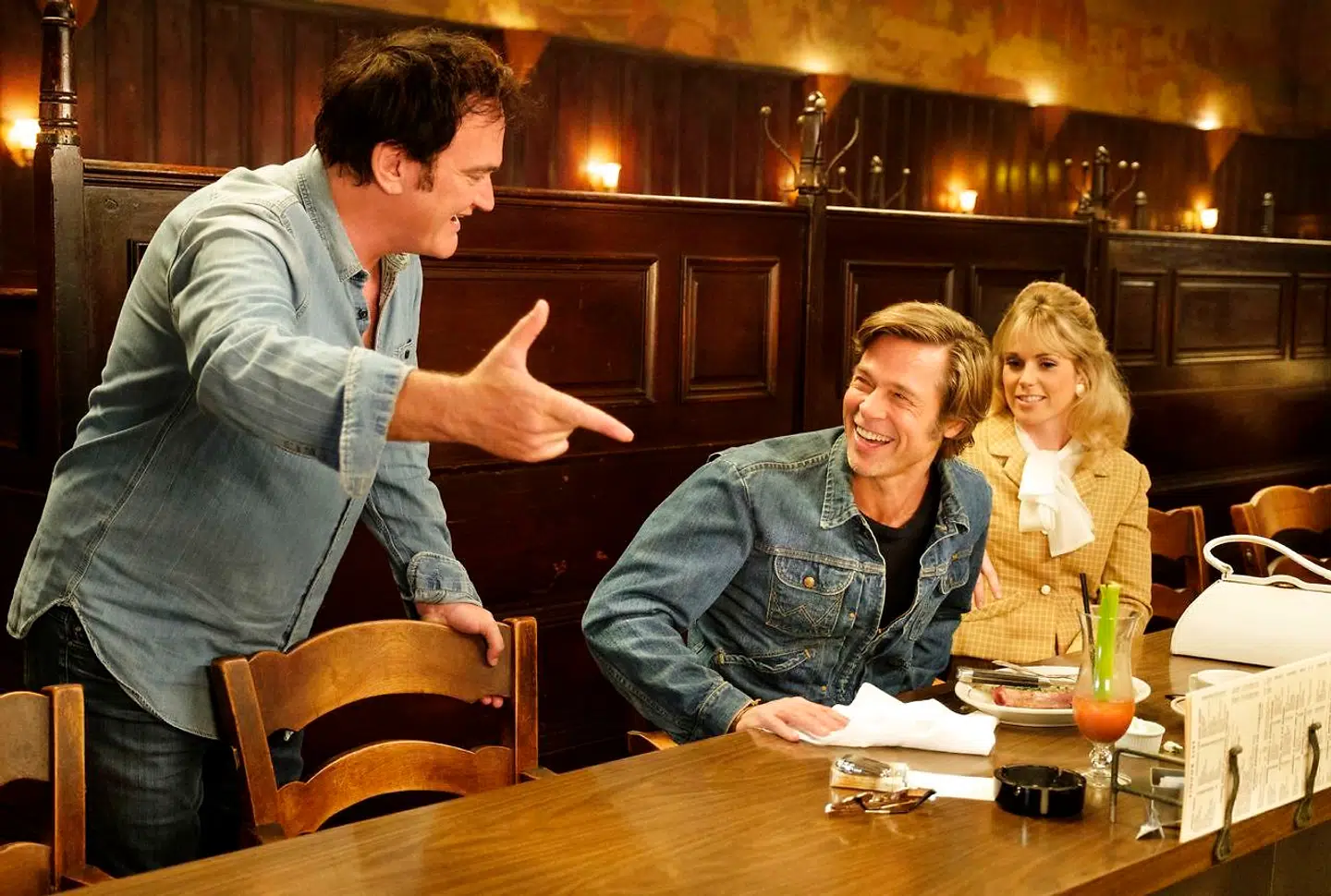 Quentin Tarantino and Brad Pitt on the set of ONCE UPON TIME IN HOLLYWOOD. (woman in shot: ELISE NYGAARD OLSON)