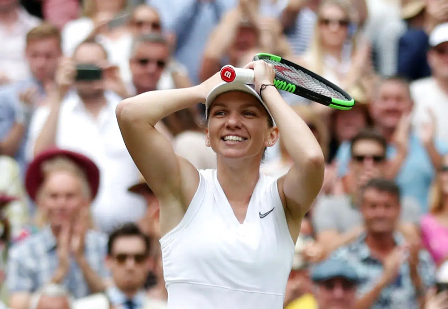 Tennis - Wimbledon - All England Lawn Tennis and Croquet Club, London, Britain - July 13, 2019 Romania's Simona Halep celebrates winning the final against Serena Williams of the U.S. REUTERS/Hannah McKay