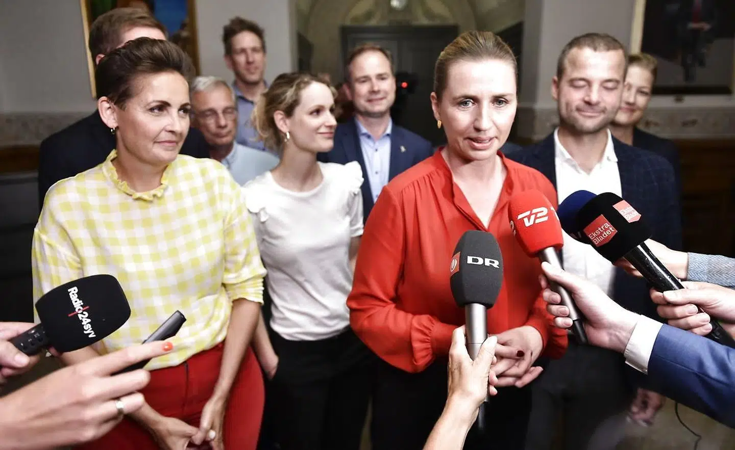 Mette Frederiksen fra Socialdemokratiet, Pia Olsen Dyhr fra SF, Pernille Skipper fra Enhedslisten og Morten Østergaard fra Radikale efter de afsluttede regeringsforhandlinger i Landstingssalen på Christiansborg.