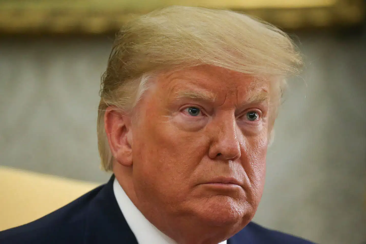 U.S. President Donald Trump listens to questions as he meets with Poland's President Andrzej Duda in the Oval Office of the White House in Washington, U.S., June 12, 2019. REUTERS/Leah Millis