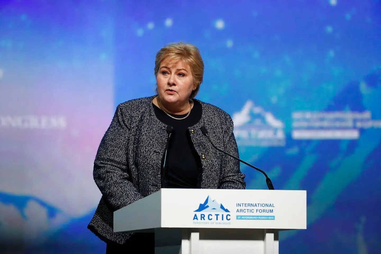 epa07494143 Norway's Prime Minister Erna Solberg speaks during a plenary session of the International Arctic Forum in Saint Petersburg, Russia, 09 April 2019. The International Arctic Forum 2019 takes place from 09 to 10 April. The forum is a key platform for discussing various issues of development of Arctic regions and mechanisms for joint discovery and effective exploitation of Arctic natural resources. EPA/ANATOLY MALTSEV