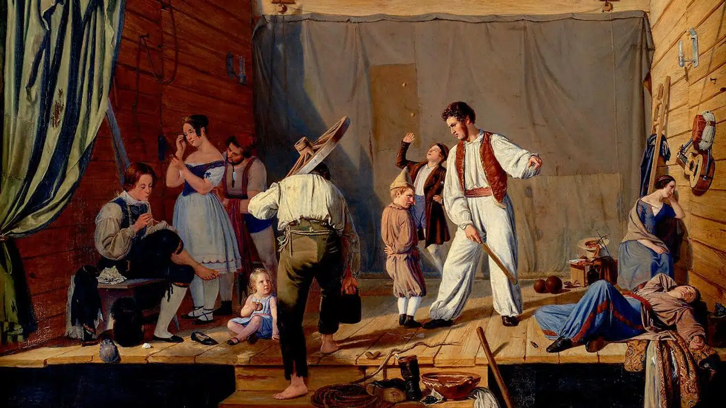 Den dansk-jødiske genremaler Julius Friedländer var en af guldalderens mest populære kunstnere. Han malede gerne gøgler- og teaterscener som denne. Det blev udstillet i 1841 på Charlottenlund maleriudstilling og købt til Den Kongelige Malerisamling. Men genremalere som Friedländer blev senere nedvurderet og kom ikke med som de repræsentative guldaldermalere. Charlotte Christensen opfordrer Statens Museum for Kunst til at tage Friedländer og andre glemte malere fra perioden 1810-1848 op fra magasinerne.