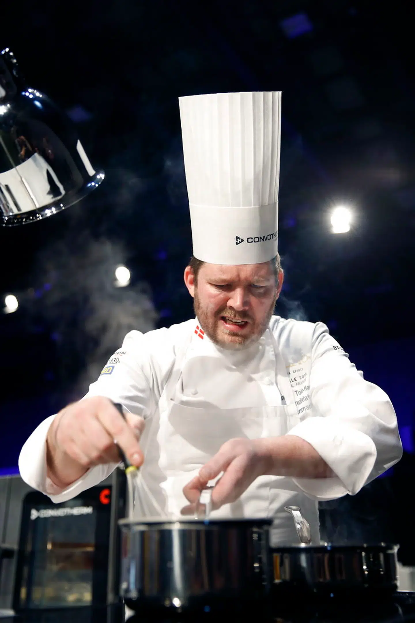 epa07329262 Chef Kenneth Toft-Hansen from Denmark prepares a dish during the first day competition of the two-day world final of the Bocuse d'Or contest at the Sirha International Hotel Catering and Food trade Exhibition, in Lyon, France, 29 January 2019. EPA/ALEX MARTIN