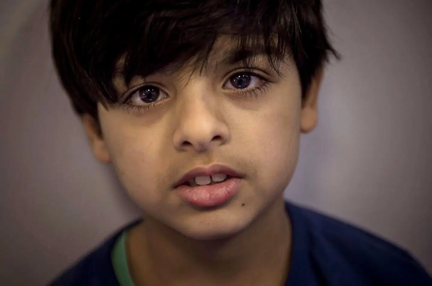 »Da vi boede i Asylcenter Ranum, lavede min mor god mad til mig. Her har vi ikke nogen penge, og vi må ikke lave mad,« siger 11-årige Ahmad.