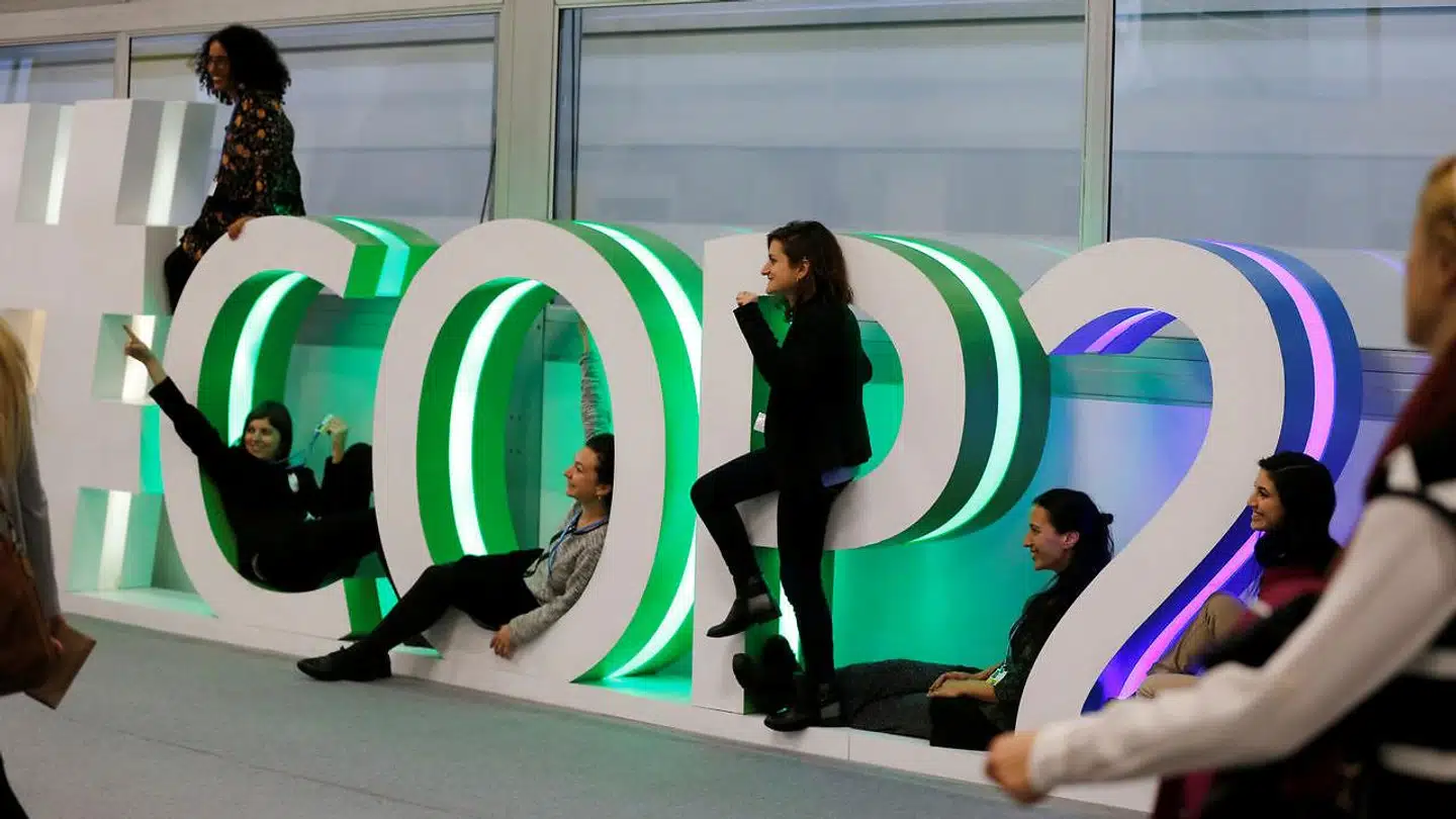 Deltagere på klimakonferencen COP24 i den polske by Katowice smiler til fotografen. Reelt er der dog ikke meget at glæde sig over på det konfliktramte møde.