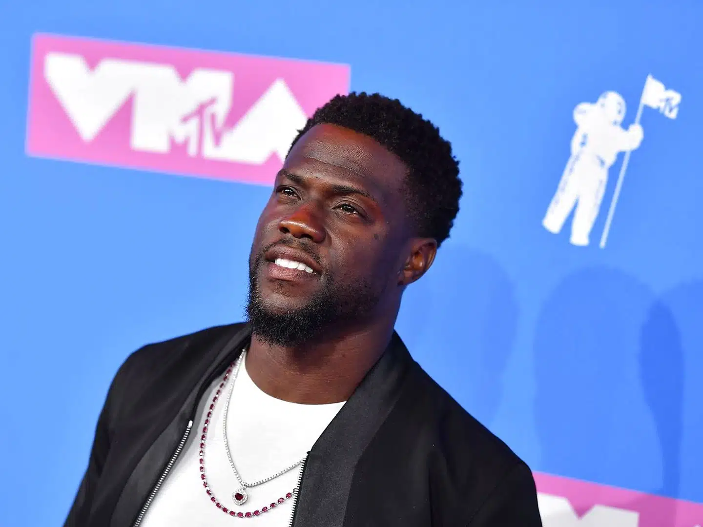 (FILES) In this file photo taken on August 20, 2018 US actor/comedian Kevin Hart attends the 2018 MTV Video Music Awards at Radio City Music Hall on August 20, 2018 in New York City. - US comedian and actor Kevin Hart announced on December 4, 2018, that he would be hosting the 91st Academy Awards in February. (Photo by ANGELA WEISS / AFP)