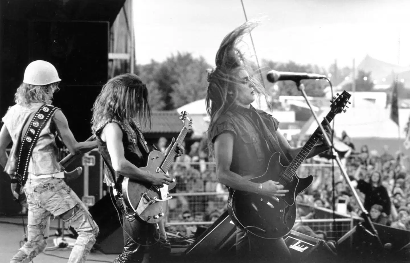 D.A.D. Jesper Binzer, Jacob Binzer, Stig Pedersen og Peter Lundholm Jensen på Roskilde Festival .; The Danish rock band D-A-D also known as Disneyland After Dark formed 1982 with Jesper Binzer, Jacob Binzer, Stig Pedersen and Peter Lundholm Jensen at Roskilde Festival.;