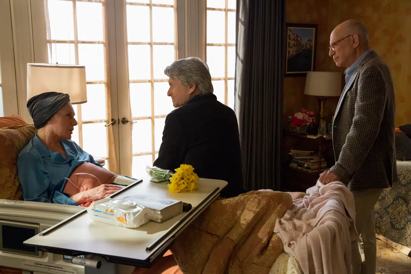 Eileen (Susan Sullivan), Sandy (Michael Douglas) og Norman (Alan Arkin) lægger planer.