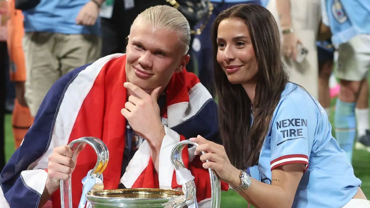 Erling Haaland sammen med Isabel Haugseng Johansen efter Champions League-triumfen.