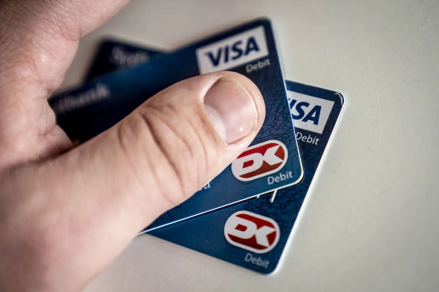 Kun en ud af cirka 60 banker i Danmark har implementeret dankortet i Apples mobilbetalingstjeneste, Apple Pay. Trods bekymring mener direktøren for Dankort i Nets, Esben Torpe Jørgensen, at der er håb for dankortets fremtid. (Arkivfoto). Mads Claus Rasmussen/Ritzau Scanpix