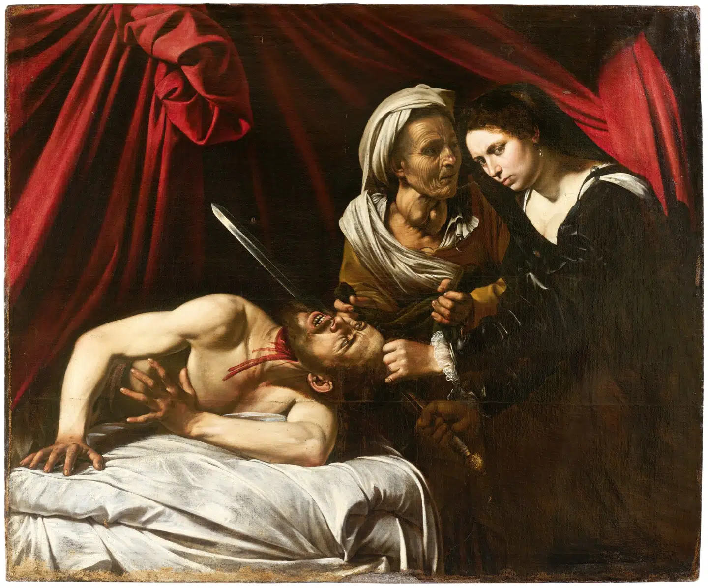 Caravaggios smukke og blodsprøjtende maleri af Judith, der skærer halsen over på den assyriske hærfører Holofernes, blev fundet på et gammelt loft i Toulouse i 2014. Foto: Wikimedia Commons