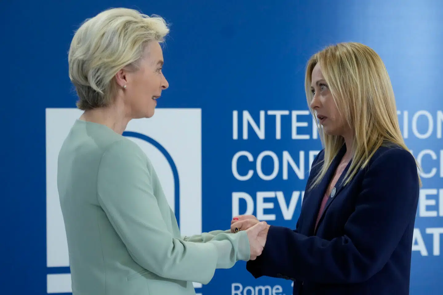 Italian Premier Giorgia Meloni, right, welcomes European Commission President Ursula von der Leyen as she arrives to attend an International conference on migration in Rome, Sunday, July 23, 2023. (AP Photo/Gregorio Borgia)