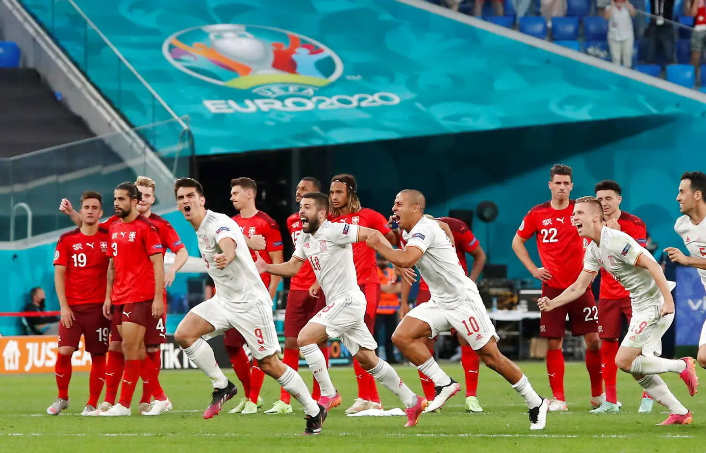 Soccer Football - Euro 2020 - Quarter Final - Switzerland v Spain - Saint Petersburg Stadium, Saint Petersburg, Russia - July 2, 2021 Spain's Gerard Moreno celebrates after the match with teammates Pool via REUTERS/Maxim Shemetov TPX IMAGES OF THE DAY