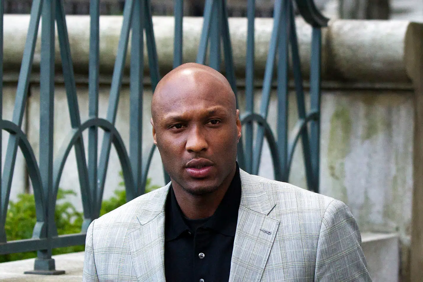 Basketball player Lamar Odom departs the New York state Supreme Court after a child custody hearing with his ex-girlfriend, Liza Morales, in Manhattan March 5, 2013. REUTERS/Lucas Jackson (UNITED STATES - Tags: CRIME LAW SPORT)