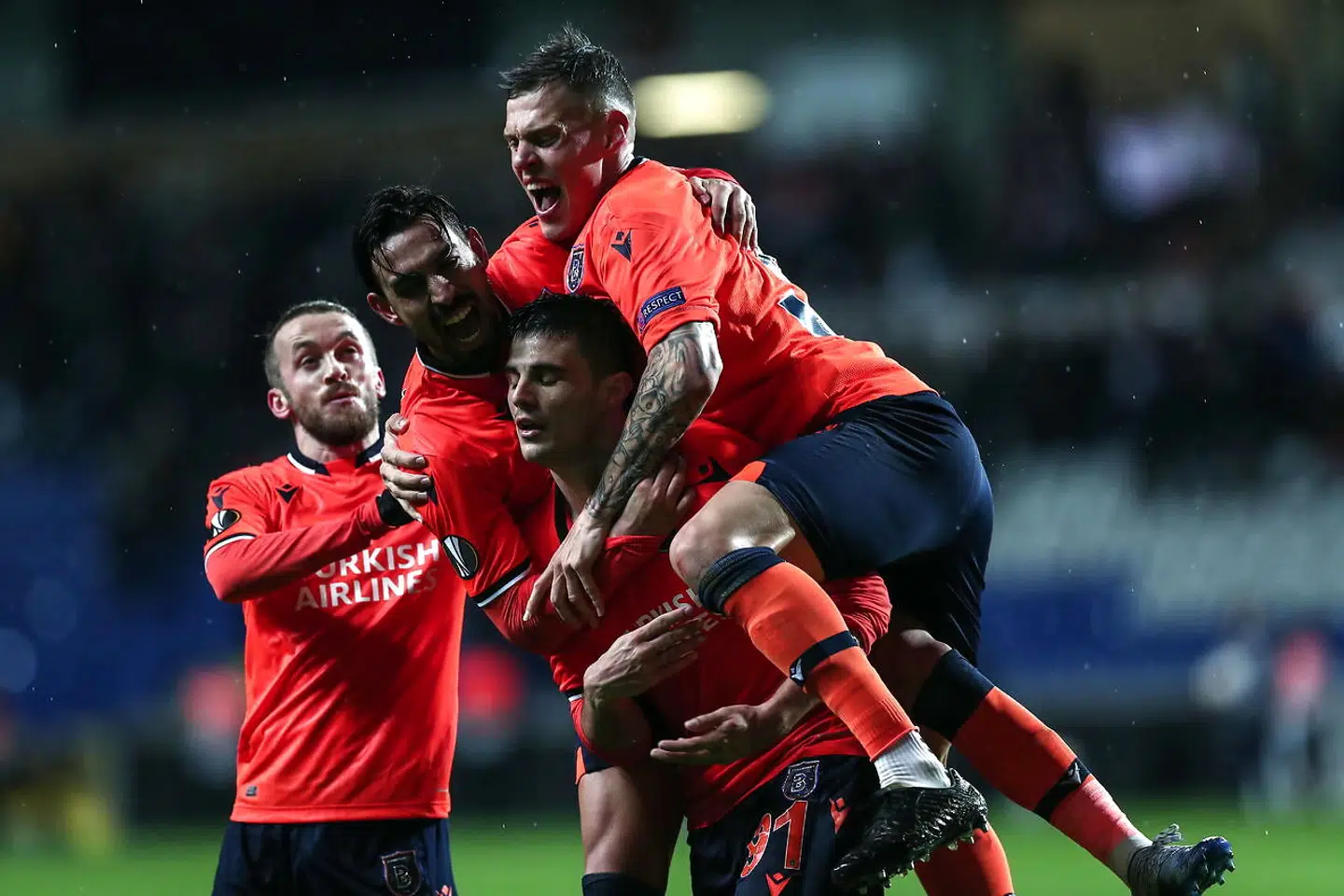 epa08253321 Basaksehir's Danijel Aleksic (C) celebrates with teammates scoring the 2-0 goal during the UEFA Europa League round of 32, 2nd leg soccer match between Basaksehir Istanbul and Sporting CP at the Fatih Terim satdium in Istanbul, Turkey, 27 February 2020. EPA/SEDAT SUNA