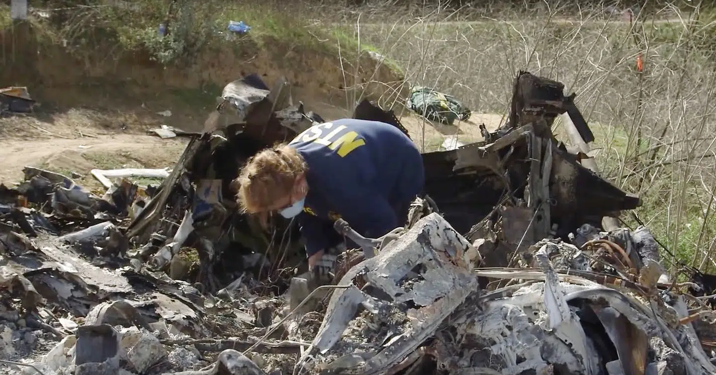 An investigator works at the site of the helicopter crash that killed Kobe Bryant and eight others in a screen grab taken in Calabasas, California, U.S. January 27, 2020 and released by the National Transportation Safety Board. NTSB/Handout via REUTERS THIS IMAGE HAS BEEN SUPPLIED BY A THIRD PARTY.