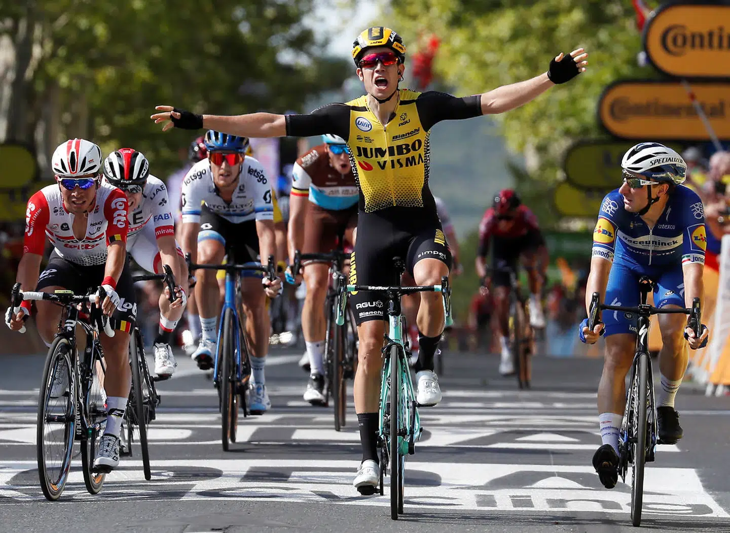 Cycling - Tour de France - The 217.5-km Stage 10 from Saint-Flour to Albi - July 15, 2019 - Team Jumbo-Visma rider Wout Van Aert of Belgium wins the stage ahead of Deceuninck-Quick Step rider Elia Viviani of Italy and Lotto Soudal rider Caleb Ewan of Australia. REUTERS/Gonzalo Fuentes
