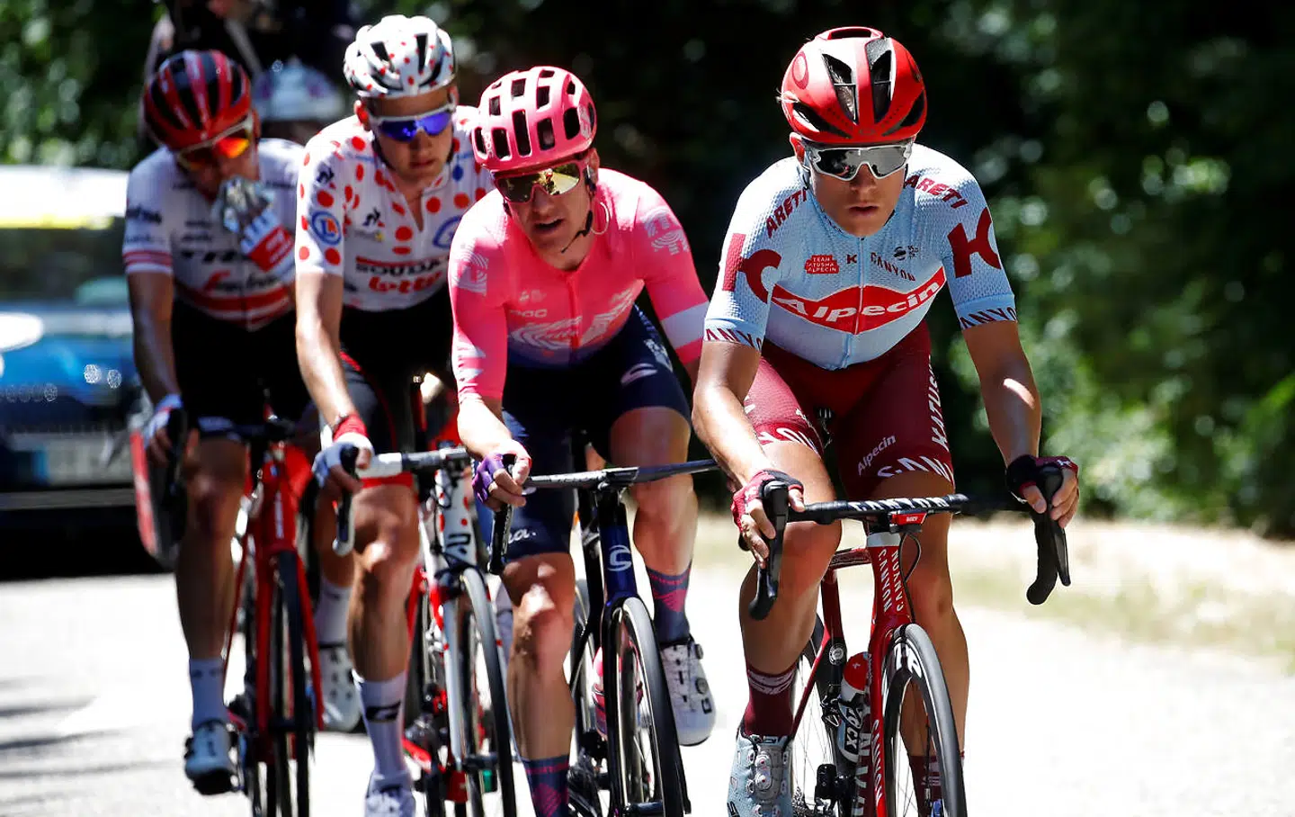 Cycling - Tour de France - The 175.5-km Stage 5 from Saint-Die-des-Vosges to Colmar - July 10, 2019 - Team Katusha Alpecin rider Mads Wurtz Schmidt of Denmark, EF Education First rider Simon Clarke of Australia, Lotto Soudal rider Tim Wellens of Belgium, wearing the polka-dot jersey, and Trek-Segafredo rider Toms Skujins of Latvia in action. REUTERS/Christian Hartmann