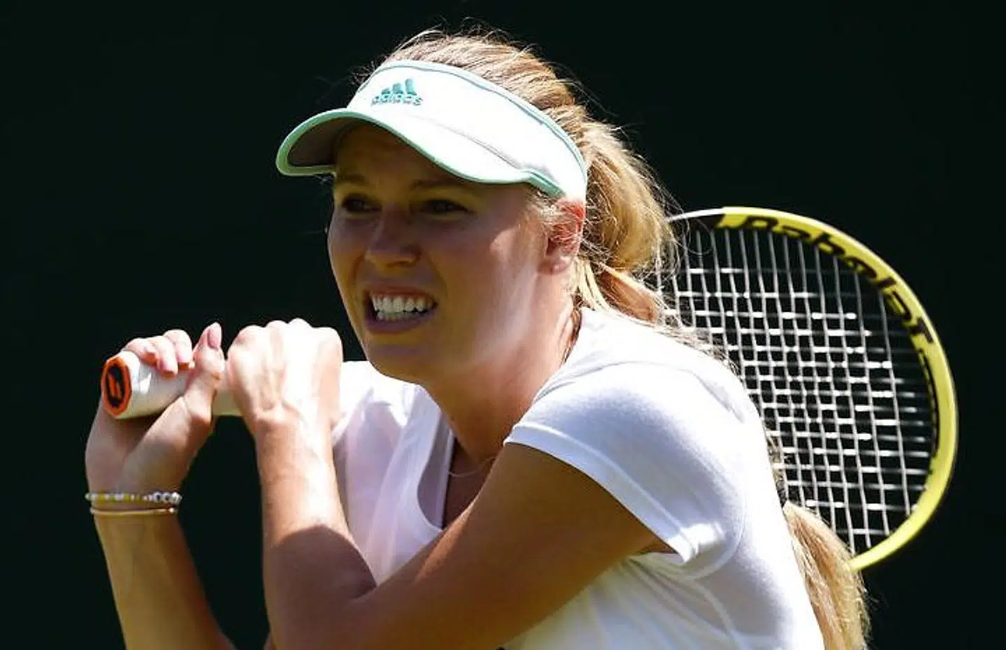 Caroline Wozniacki på træningsbanen i London før Wimbledon-turneringen, der mandag serves i gang.