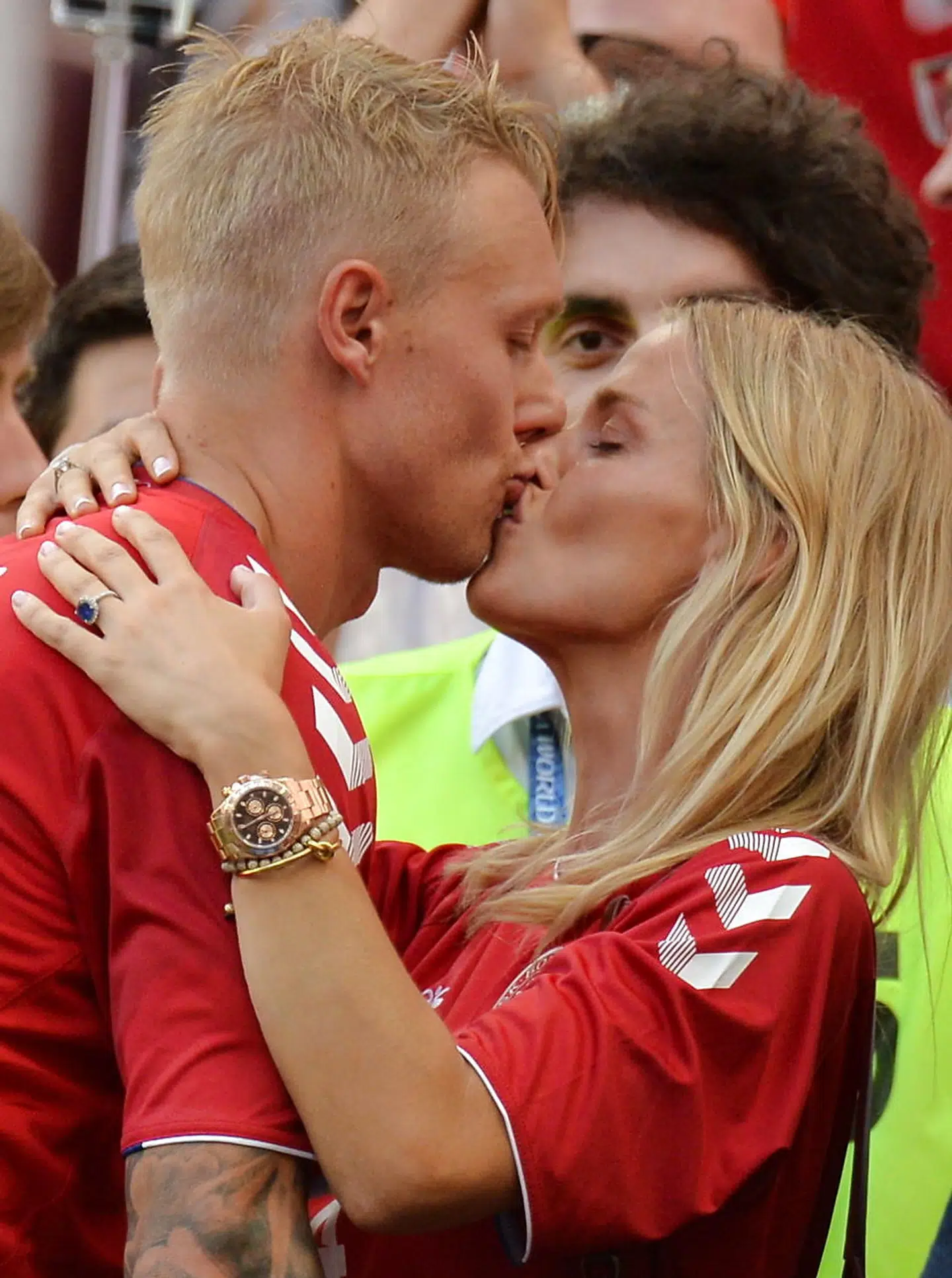 epa06842107 Simon Kjaer (L) of Denmark celebrates with his wife Elina Gollert after the FIFA World Cup 2018 group C preliminary round soccer match between Denmark and France in Moscow, Russia, 26 June 2018. (RESTRICTIONS APPLY: Editorial Use Only, not used in association with any commercial entity - Images must not be used in any form of alert service or push service of any kind including via mobile alert services, downloads to mobile devices or MMS messaging - Images must appear as still images and must not emulate match action video footage - No alteration is made to, and no text or image is superimposed over, any published image which: (a) intentionally obscures or removes a sponsor identification image; or (b) adds or overlays the commercial identification of any third party which is not officially associated with the FIFA World Cup) EPA/PETER POWELL EDITORIAL USE ONLY