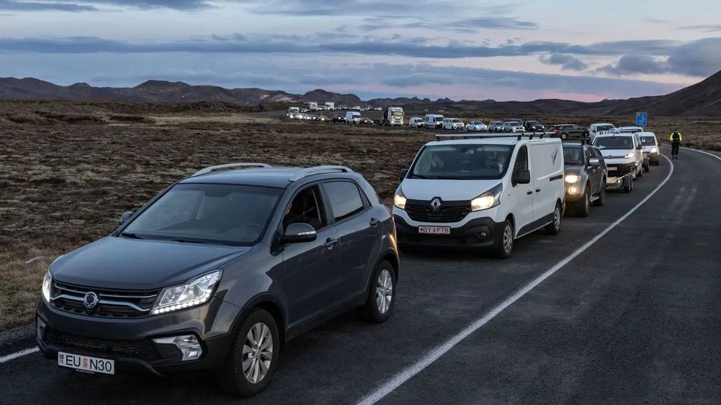 Local residents wait in their cars to get access to their homes in the fishing town of Grindavik, which was evacuated due to volcanic activity, in Iceland November 15, 2023. REUTERS/Marko Djurica