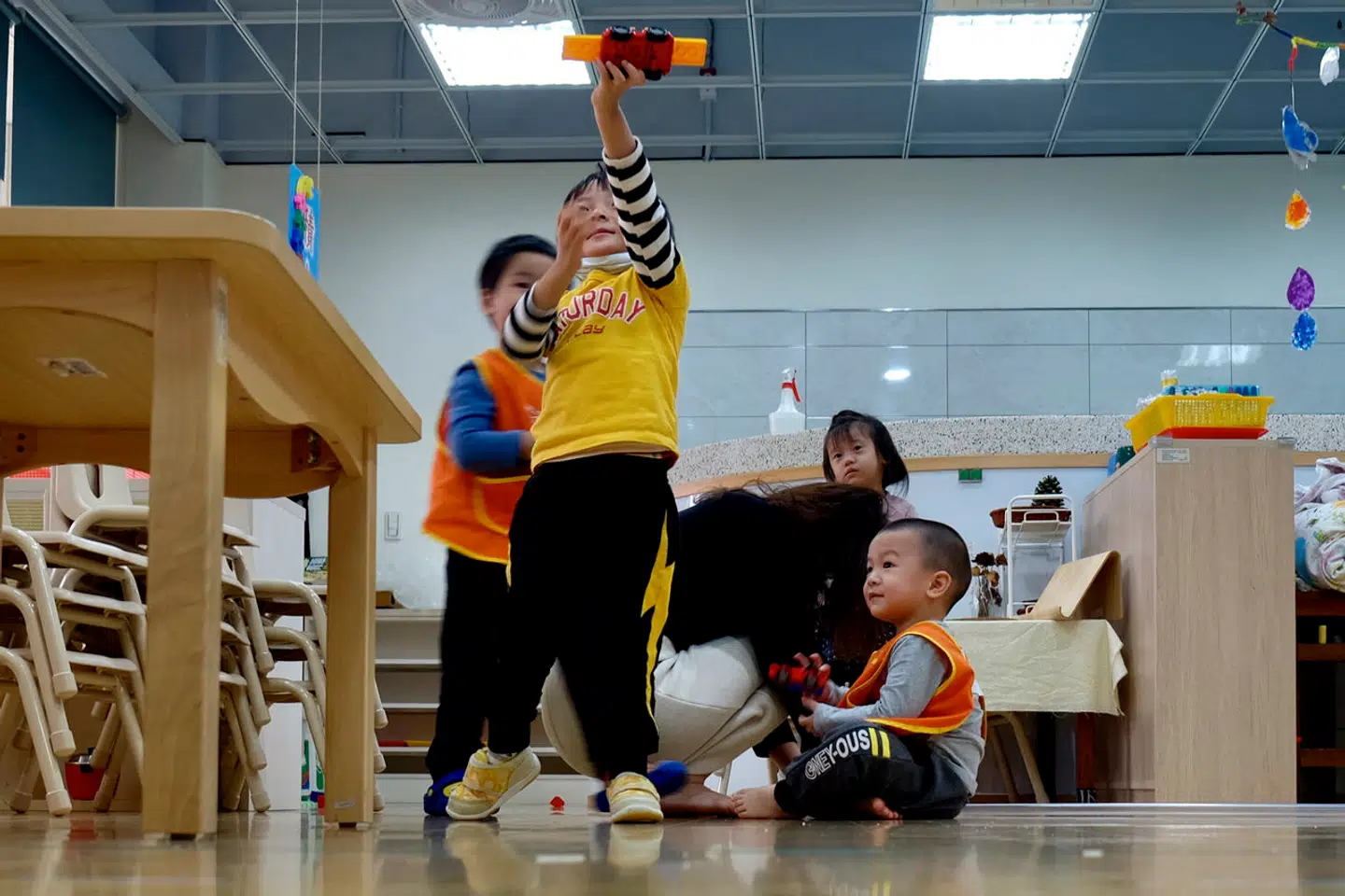 I 1951 fødte hver taiwansk kvinde i snit syv børn. I dag er det knap et barn pr. kvinde. En afledt effekt er, at øen lægger enorm vægt på det enkelte barns uddannelse. Arkivfoto: Sam Yeh/AFP/Ritzau Scanpix