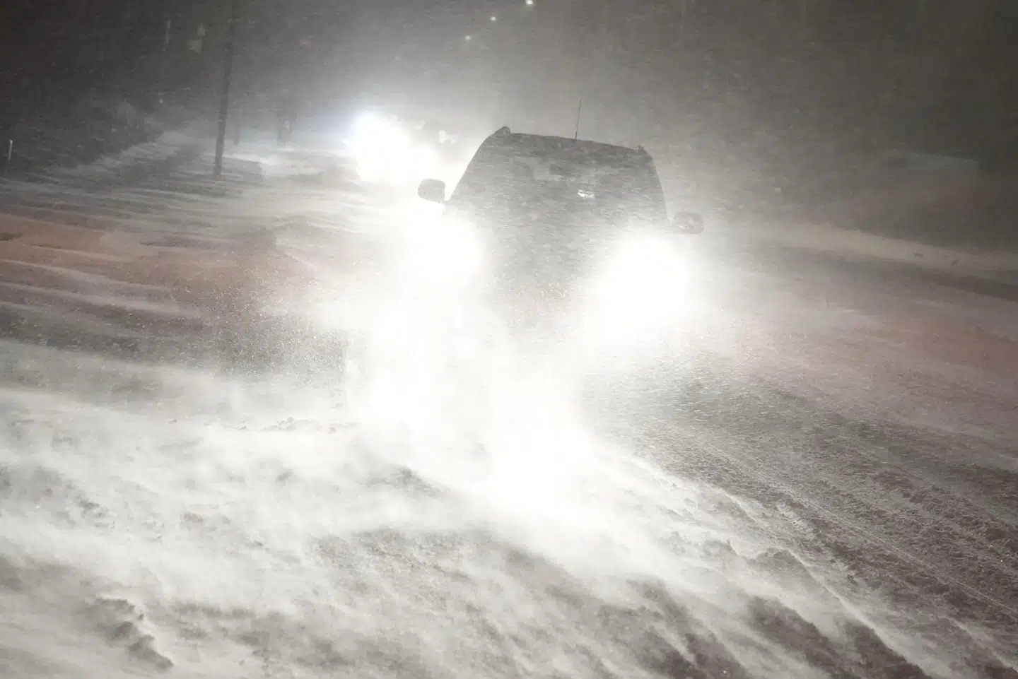 Bilister i snestormen.